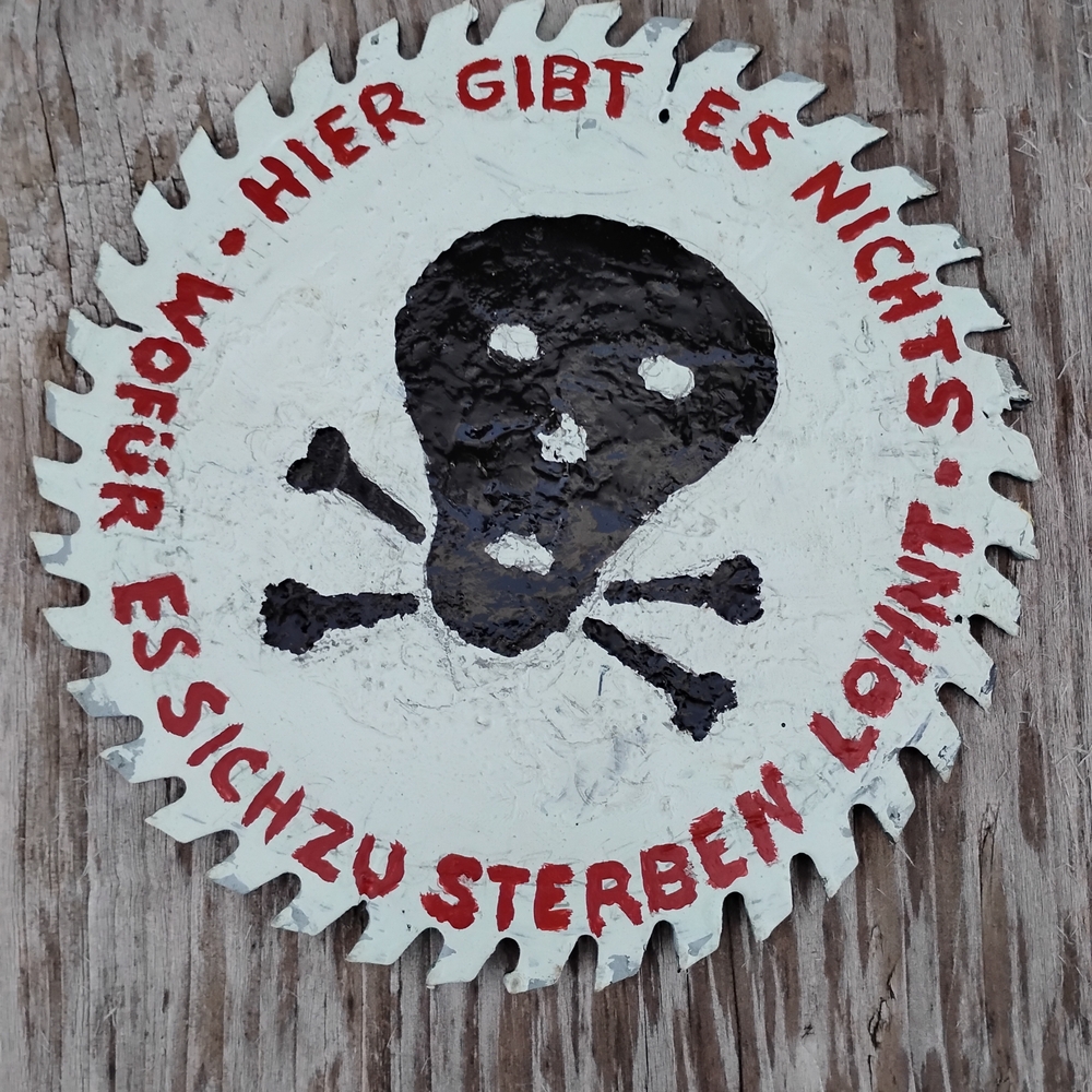 Edgy Skull and Crossbones Saw Blade Wall Art - Black and Red . Metal 7 Inch